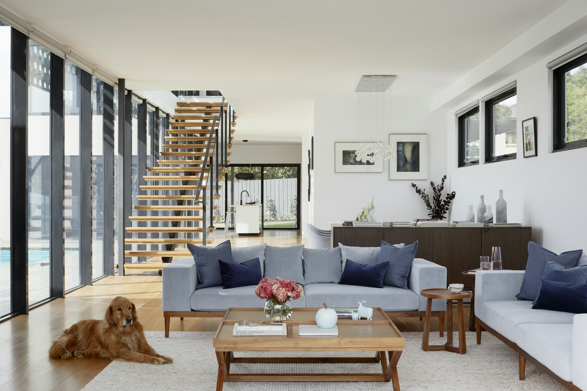 An open-plan living room opening onto the garden